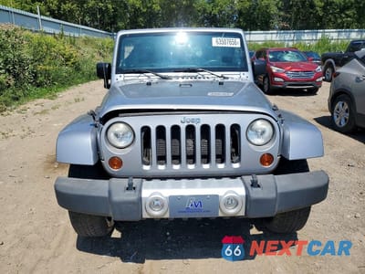 Piąte zdjęcie samochodu w środku: 2013 JEEP WRANGLER UNLIMITED SAHARA VIN:1C4BJWEGXDL548221 - miniatura