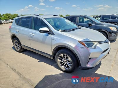 Czwarte zdjęcie samochodu z boku: 2016 TOYOTA RAV4 HV XLE VIN:JTMRJREV5GD022799 - miniatura