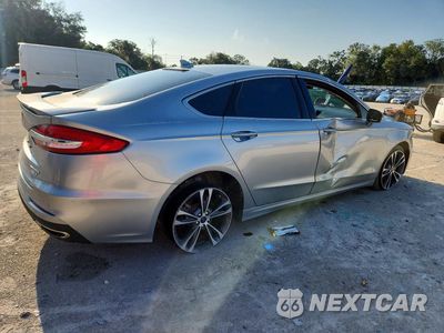 Trzecie zdjęcie samochodu z tyłu: 2020 FORD FUSION TITANIUM VIN:3FA6P0D93LR152783 - miniatura
