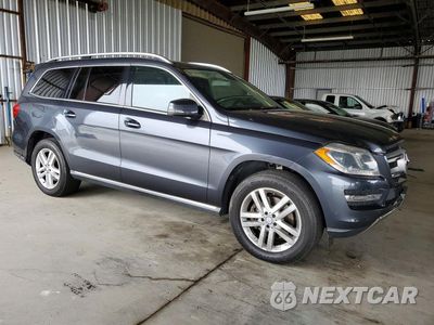 Czwarte zdjęcie samochodu z boku: 2014 MERCEDES-BENZ GL 450 4MATIC VIN:4JGDF7CEXEA339586 - miniatura