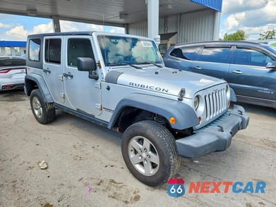 Czwarte zdjęcie samochodu z boku: 2010 JEEP WRANGLER UNLIMITED RUBICON VIN:1J4BA6H18AL133962 - miniatura