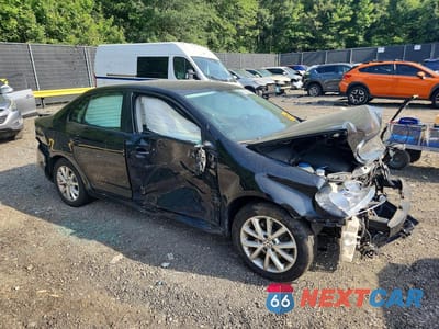 Czwarte zdjęcie samochodu z boku: 2010 VOLKSWAGEN JETTA LIMITED VIN:3VWAZ7AJ1AM102753 - miniatura