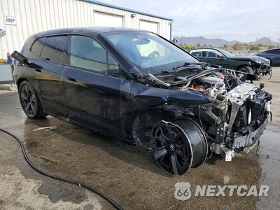 Czwarte zdjęcie samochodu z boku: 2024 BMW IX XDRIVE50 VIN:WB523CF04RCN52035 - miniatura