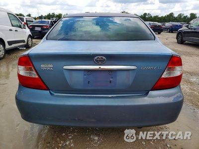Zdjęcie 6 z 13 samochodu: 2002 TOYOTA CAMRY LE VIN:4T1BE32K72U511397 - miniatura