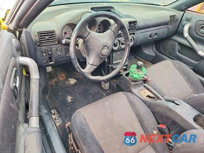 Zdjęcie 8 z 12 samochodu: 2002 TOYOTA MR2 SPYDER VIN:JTDFR320520046246 - miniatura