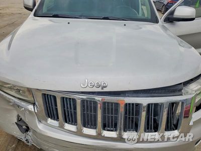 Zdjęcie 12 z 13 samochodu: 2013 JEEP GRAND CHEROKEE LAREDO VIN:1C4RJEAG6DC620885 - miniatura