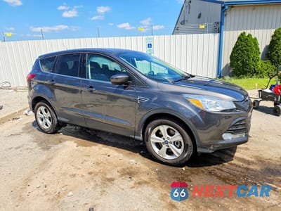 Czwarte zdjęcie samochodu z boku: 2016 FORD ESCAPE SE VIN:1FMCU9G93GUA07128 - miniatura
