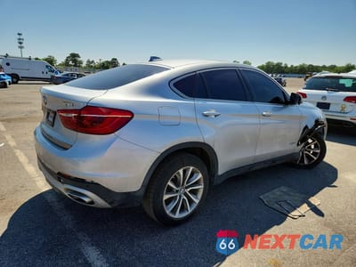Trzecie zdjęcie samochodu z tyłu: 2019 BMW X6 SDRIVE35I VIN:5UXKU0C54K0H98947 - miniatura