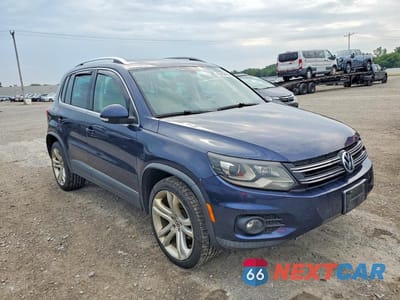 Czwarte zdjęcie samochodu z boku: 2013 VOLKSWAGEN TIGUAN S VIN:WVGBV3AXXDW561117 - miniatura