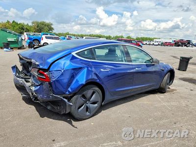 Trzecie zdjęcie samochodu z tyłu: 2018 TESLA MODEL 3 VIN:5YJ3E1EB0JF115182 - miniatura