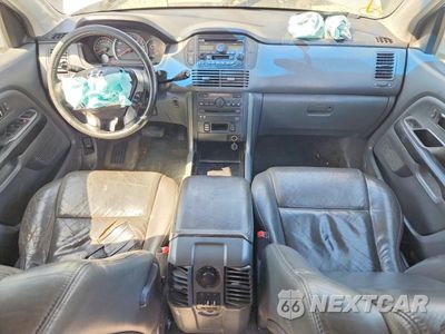 Zdjęcie 15 z 26 samochodu: 2004 HONDA PILOT EXL VIN:2HKYF18624H620163 - miniatura