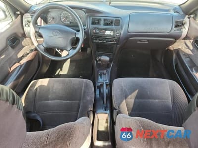 Zdjęcie 8 z 12 samochodu: 1994 TOYOTA COROLLA DX VIN:1NXAE09B2RZ193165 - miniatura