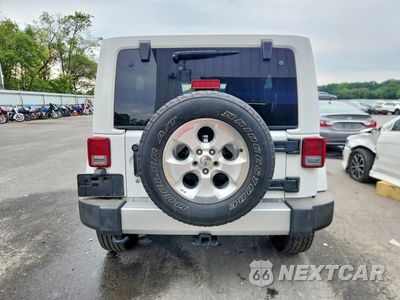 Zdjęcie 6 z 14 samochodu: 2014 JEEP WRANGLER UNLIMITED SAHARA VIN:1C4HJWEG7EL128024 - miniatura