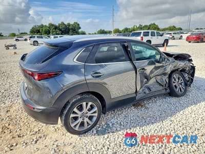 Trzecie zdjęcie samochodu z tyłu: 2023 MAZDA CX-30 SELECT VIN:3MVDMBBM9PM562499 - miniatura