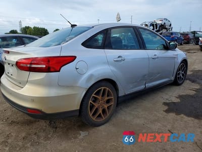 Trzecie zdjęcie samochodu z tyłu: 2018 FORD FOCUS SEL VIN:1FADP3H23JL242484 - miniatura