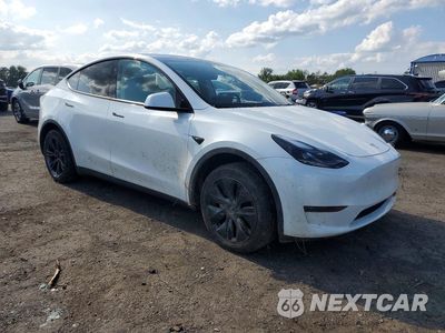 Czwarte zdjęcie samochodu z boku: 2024 TESLA MODEL Y VIN:7SAYGDEDXRF104739 - miniatura