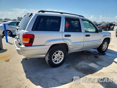 Trzecie zdjęcie samochodu z tyłu: 2004 JEEP GRAND CHEROKEE LAREDO VIN:1J4GX48S04C386019 - miniatura