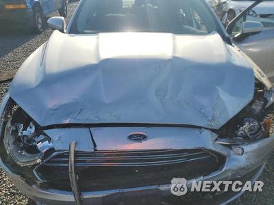Zdjęcie 11 z 12 samochodu: 2017 FORD FUSION SE HYBRID VIN:3FA6P0LUXHR325762 - miniatura
