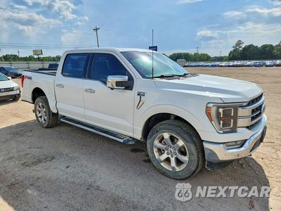 Czwarte zdjęcie samochodu z boku: 2022 FORD F150 SUPERCREW VIN:1FTFW1E89NFB92083 - miniatura