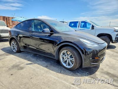 Czwarte zdjęcie samochodu z boku: 2023 TESLA MODEL Y VIN:7SAYGDEE2PA042210 - miniatura