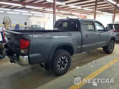 Trzecie zdjęcie samochodu z tyłu: 2019 TOYOTA TACOMA TRD OFF-ROAD VIN:3TMDZ5BN7KM077090 - miniatura