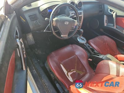 Zdjęcie 8 z 12 samochodu: 2007 HYUNDAI TIBURON GT VIN:KMHHN66F27U235131 - miniatura