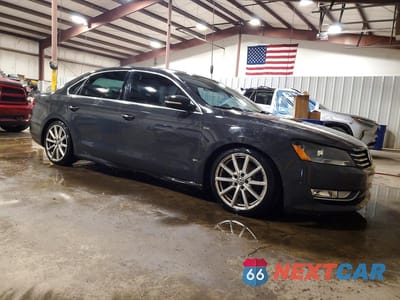 Czwarte zdjęcie samochodu z boku: 2015 VOLKSWAGEN PASSAT SE VIN:1VWBT7A35FC014997 - miniatura