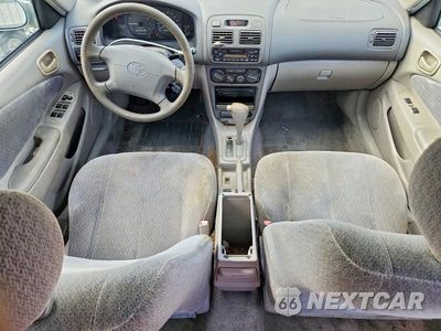 Zdjęcie 8 z 12 samochodu: 2001 TOYOTA COROLLA LE VIN:2T1BR12E11C393818 - miniatura