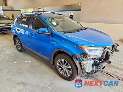 Czwarte zdjęcie samochodu z boku: 2016 TOYOTA RAV4 HV XLE VIN:JTMRJREV7GD007026 - miniatura
