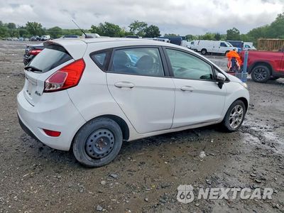 Trzecie zdjęcie samochodu z tyłu: 2014 FORD FIESTA SE VIN:3FADP4EJ3EM225562 - miniatura