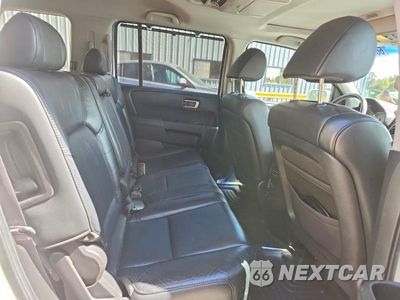 Zdjęcie 10 z 12 samochodu: 2011 HONDA PILOT TOURING VIN:5FNYF4H98BB084603 - miniatura