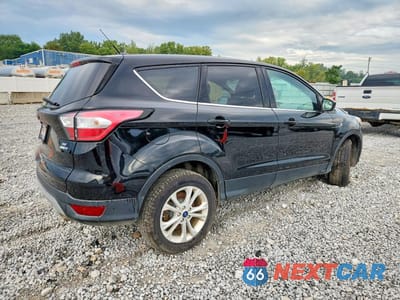 Trzecie zdjęcie samochodu z tyłu: 2017 FORD ESCAPE SE VIN:1FMCU9GD7HUD28868 - miniatura