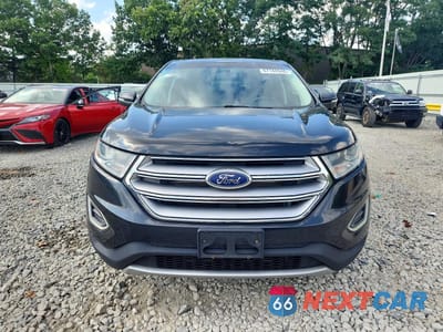 Piąte zdjęcie samochodu w środku: 2015 FORD EDGE TITANIUM VIN:2FMTK4K86FBB21832 - miniatura
