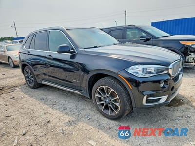 Czwarte zdjęcie samochodu z boku: 2018 BMW X5 XDR40E VIN:5UXKT0C5XJ0V99450 - miniatura