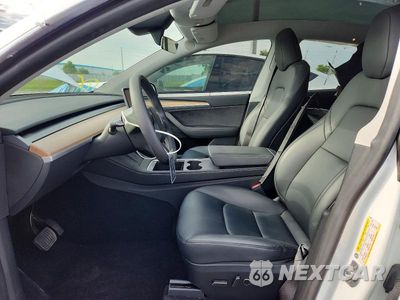 Zdjęcie 7 z 13 samochodu: 2024 TESLA MODEL Y VIN:7SAYGDEE0RA259452 - miniatura