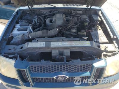 Zdjęcie 12 z 13 samochodu: 2001 FORD EXPLORER SPORT VIN:1FMYU60E21UA97827 - miniatura