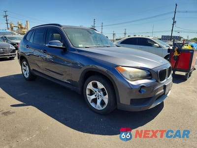 Czwarte zdjęcie samochodu z boku: 2014 BMW X1 SDRIVE28I VIN:WBAVM1C5XEVW50517 - miniatura