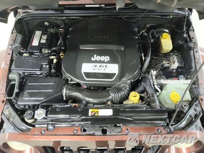 Zdjęcie 12 z 13 samochodu: 2013 JEEP WRANGLER UNLIMITED SAHARA VIN:1C4BJWEG0DL698502 - miniatura