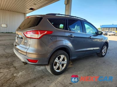 Trzecie zdjęcie samochodu z tyłu: 2014 FORD ESCAPE SE VIN:1FMCU9GXXEUA26156 - miniatura
