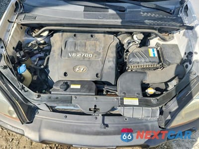 Zdjęcie 12 z 13 samochodu: 2007 HYUNDAI TUCSON SE VIN:KM8JN72D27U545369 - miniatura