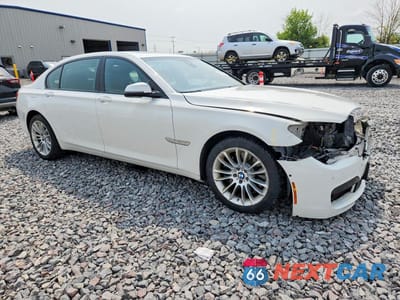 Czwarte zdjęcie samochodu z boku: 2015 BMW 750 LXI VIN:WBAYF8C5XFD655160 - miniatura