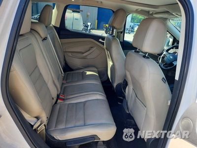 Zdjęcie 11 z 13 samochodu: 2017 FORD ESCAPE TITANIUM VIN:1FMCU9J98HUE21600 - miniatura