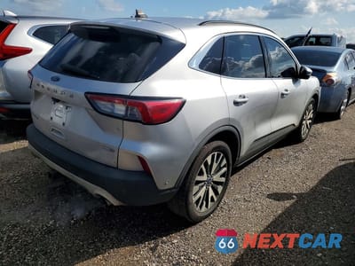 Trzecie zdjęcie samochodu z tyłu: 2020 FORD ESCAPE AWD 4C 4D SUV 2.0L TITANIUM VIN:1FMCU9J94LUB25014 - miniatura
