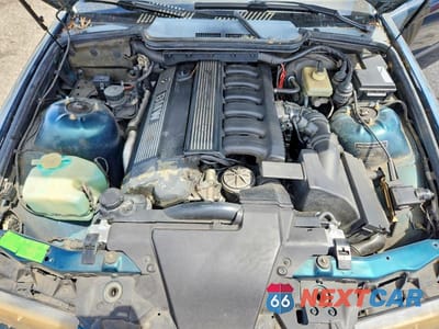 Zdjęcie 11 z 12 samochodu: 1994 BMW 325 IC AUTOMATIC VIN:WBABJ6326RJD32327 - miniatura
