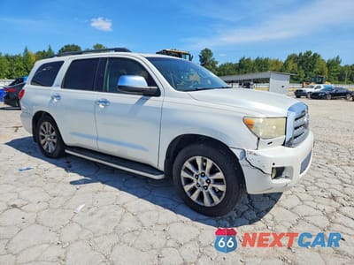 Czwarte zdjęcie samochodu z boku: 2010 TOYOTA SEQUOIA PLATINUM VIN:5TDYY5G17AS024592 - miniatura