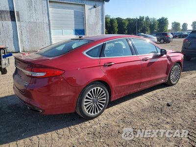 Trzecie zdjęcie samochodu z tyłu: 2017 FORD FUSION TITANIUM VIN:3FA6P0K93HR122001 - miniatura