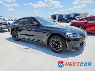 Czwarte zdjęcie samochodu z boku: 2023 BMW I4 EDRIVE 35 VIN:WBY43AW0XPFP65485 - miniatura