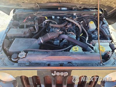 Zdjęcie 12 z 14 samochodu: 2009 JEEP WRANGLER UNLIMITED SAHARA VIN:1J4GA59109L769608 - miniatura