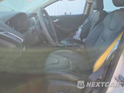 Zdjęcie 7 z 12 samochodu: 2016 FORD FOCUS TITANIUM VIN:1FADP3J25GL289034 - miniatura