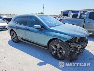 Czwarte zdjęcie samochodu z boku: 2024 BMW IX XDRIVE50 VIN:WB523CF07RCN98989 - miniatura
